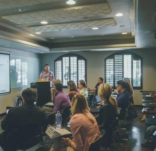 Classroom with adult teachers & students