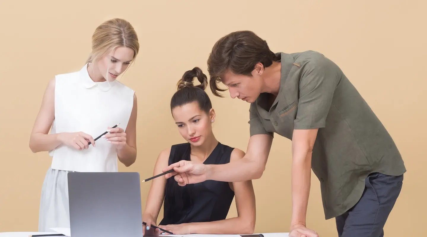 Man & woman teaching a new hire